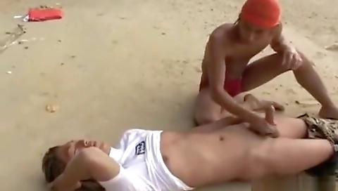 Sexy coed with ale dunkedicoping on the beach