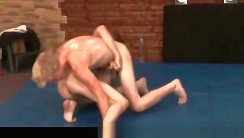 Sexy young girl with a dildo fucks her friend